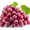 Ripe red grapes with leaves isolated